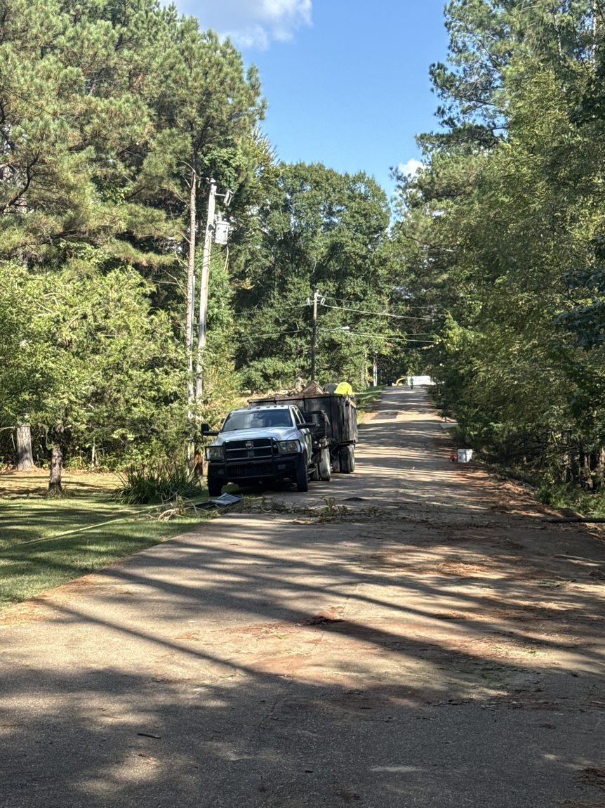 Debris hauling and property cleanup in Madison, Mississippi by Eaves Enterprises