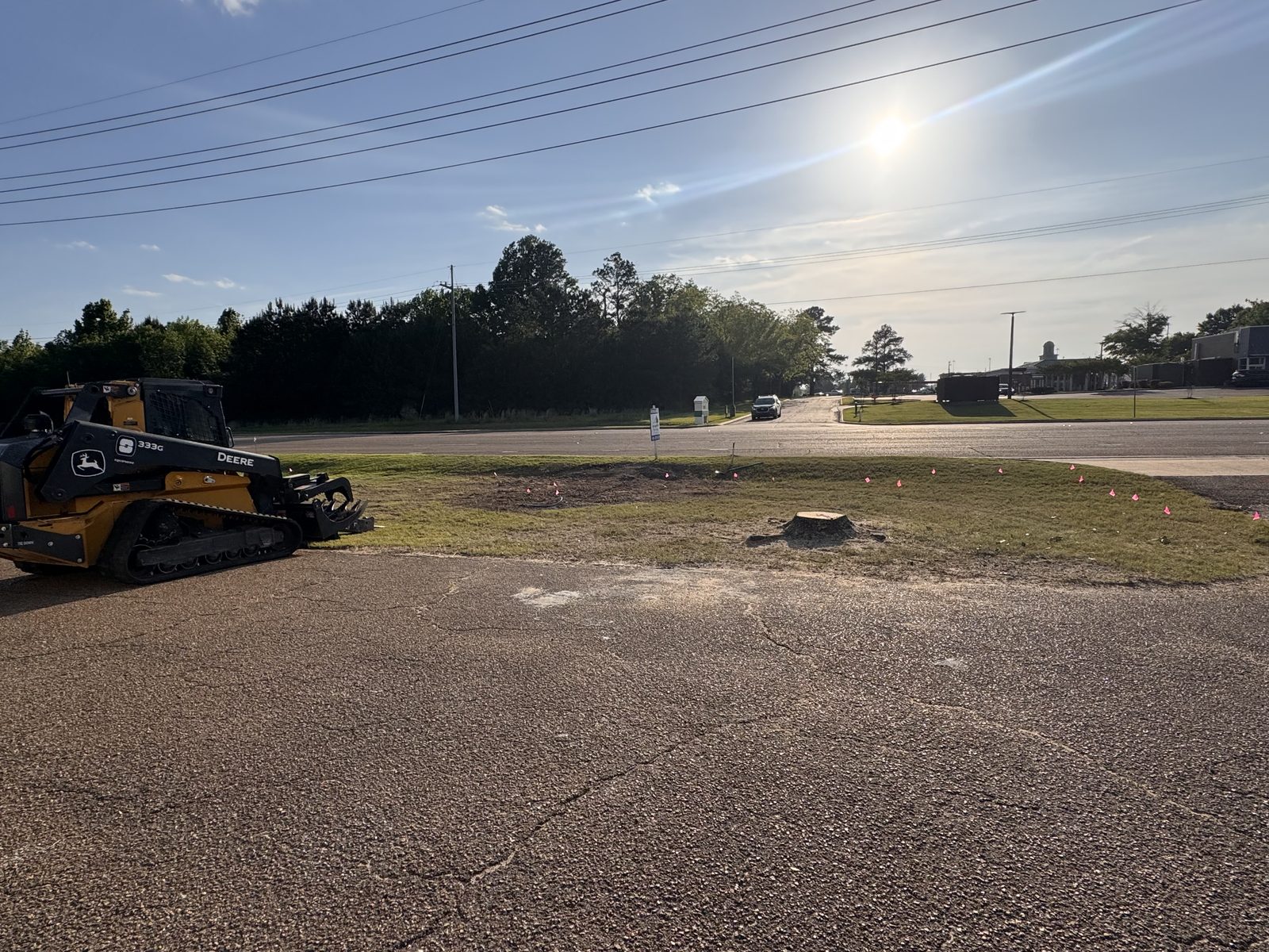 Skid steer grading dirt work